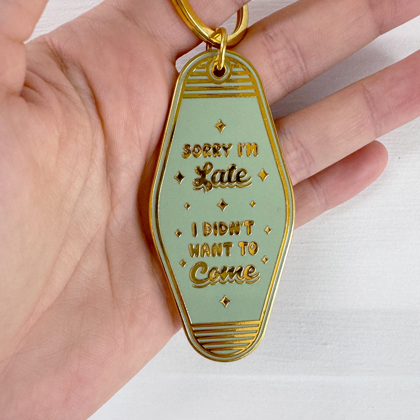 SORRY I'M LATE MOTEL KEYCHAIN