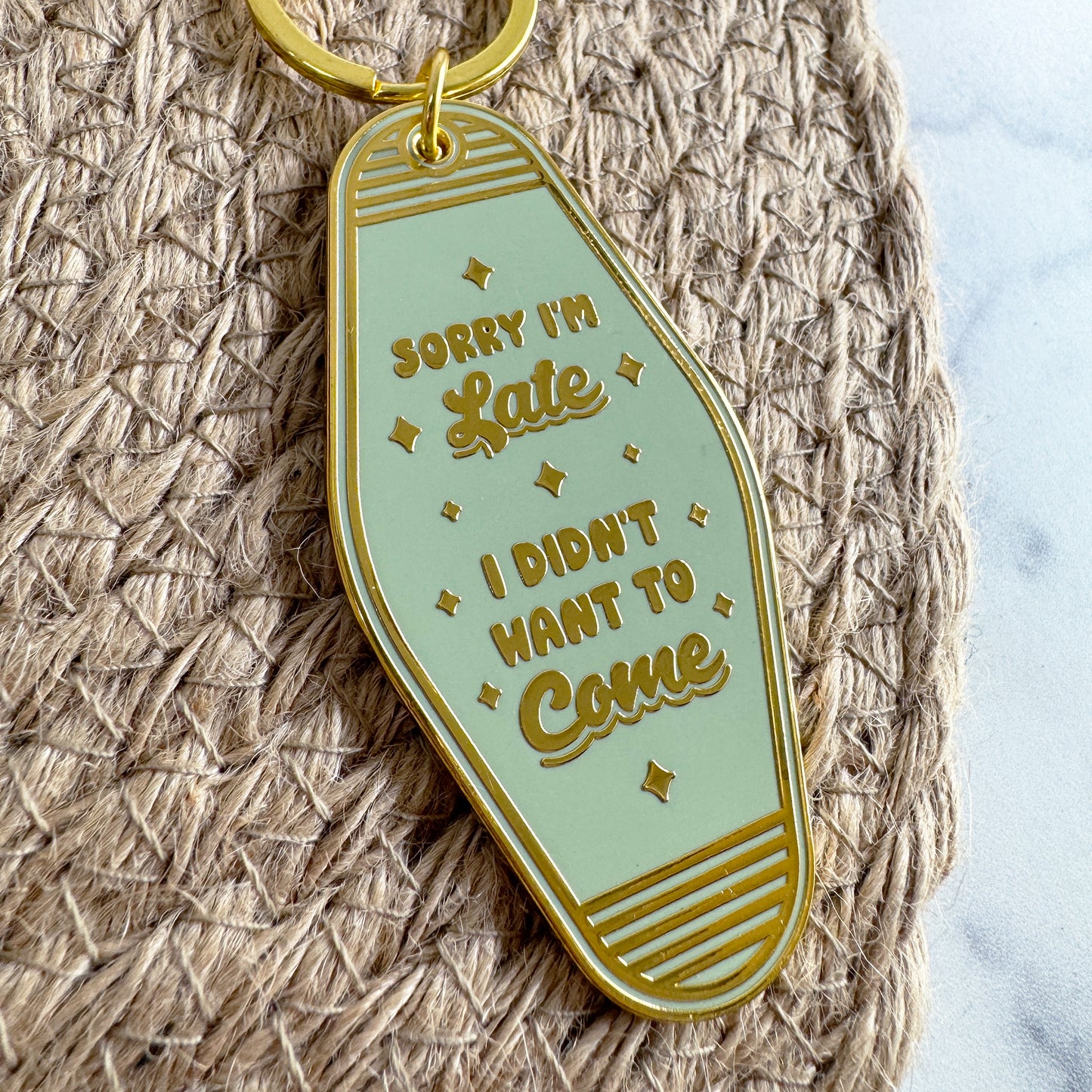 SORRY I'M LATE MOTEL KEYCHAIN